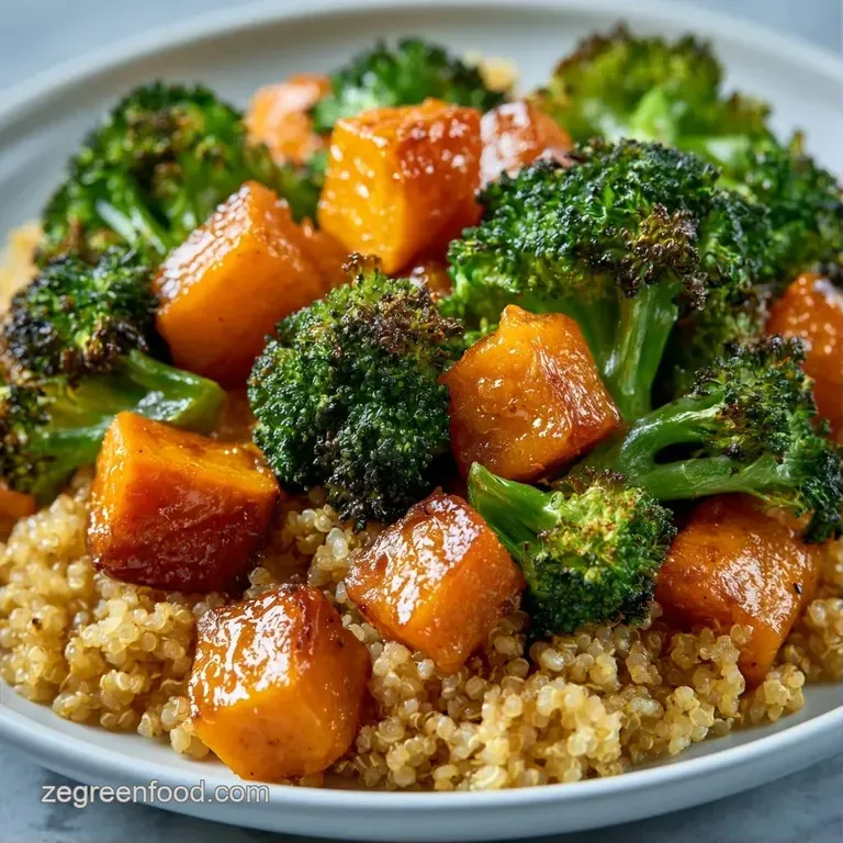 Symmetrically arranged bowl of golden quinoa, sliced avocado, and bright carrots drizzled with a creamy dressing.